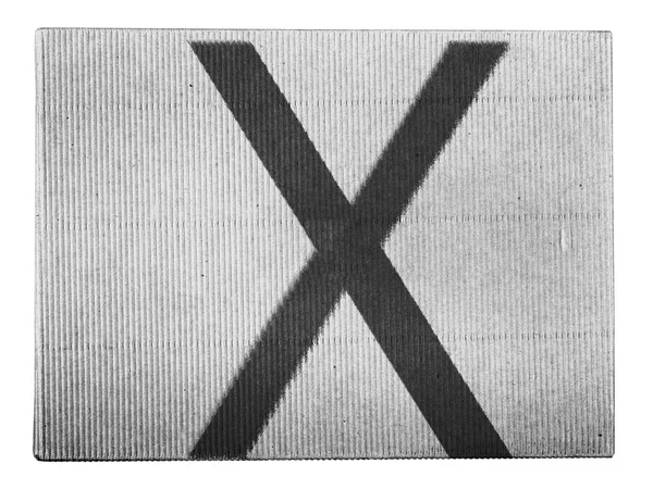 X letter painted on carton box — Stock Photo, Image