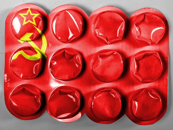 The USSR flag painted on painted on tablets or pills — Stock Photo, Image