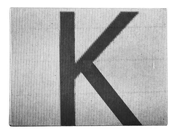 K letter painted on carton box — Stock Photo, Image