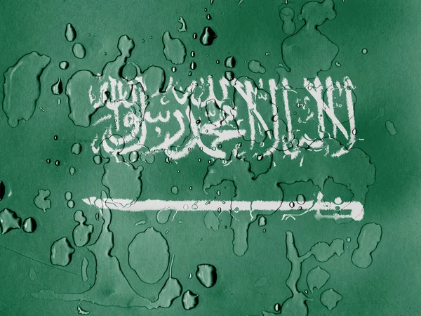 Arábia Saudita bandeira coberta com gotas de água — Fotografia de Stock