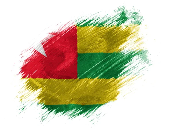 Togo Flagge mit Pinsel auf weißem Hintergrund bemalt — Stockfoto