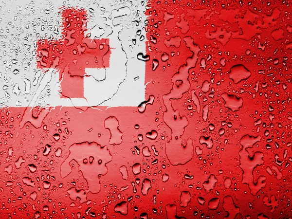 Tonga flag covered with water drops — Stock Photo, Image