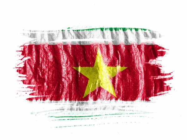 Bandeira do Suriname pintada com aquarela em papel branco molhado — Fotografia de Stock