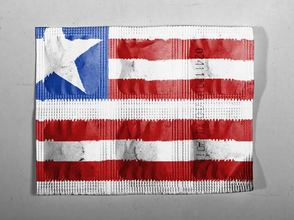 Liberia. Liberias flagga målade på piller — Stockfoto
