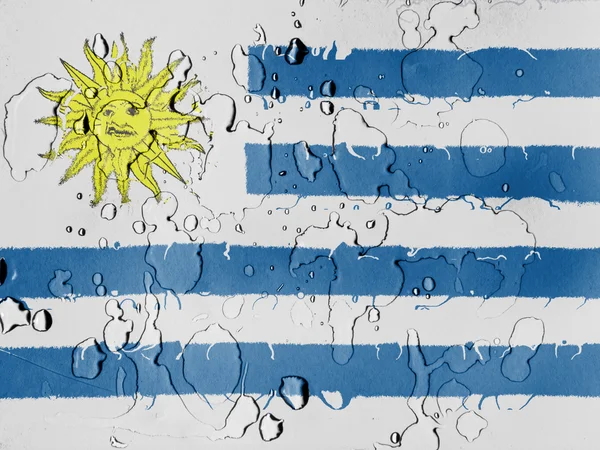 Uruguay vlag bedekt met water drops — Stockfoto