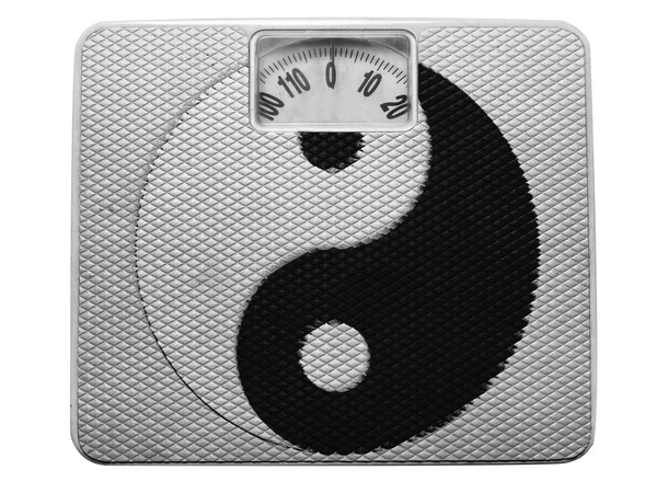 De ying yang teken geschilderd op geschilderd op evenwicht — Stockfoto