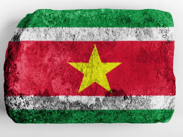 Surinaamse vlag geschilderd op baksteen — Stockfoto