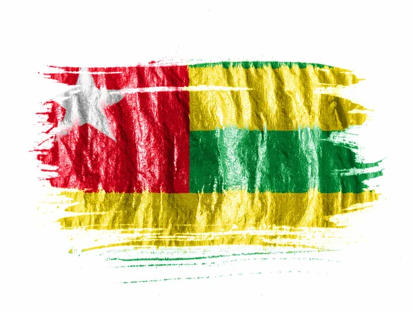Togo flag painted with watercolor on wet white paper — Stock Photo, Image