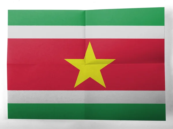 Surinamesische Flagge auf einfachem Papierblatt gemalt — Stockfoto