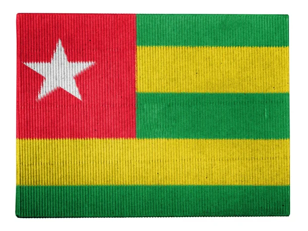 Bandeira do Togo pintada na caixa de papelão — Fotografia de Stock