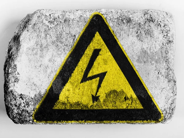 Electric shock sign painted on painted on brick — Stock Photo, Image