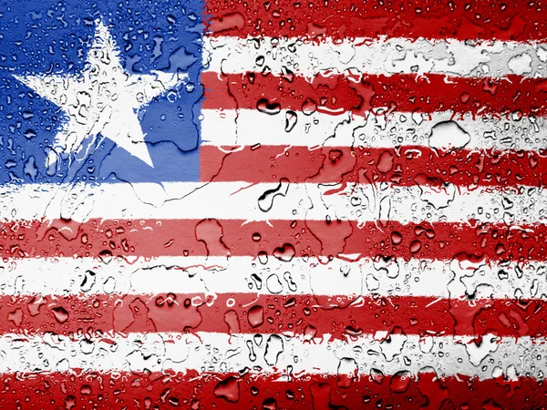 Liberia. Liberian flag covered with water drops — Stock Photo, Image