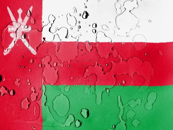 Oman flag covered with water drops — Stock Photo, Image