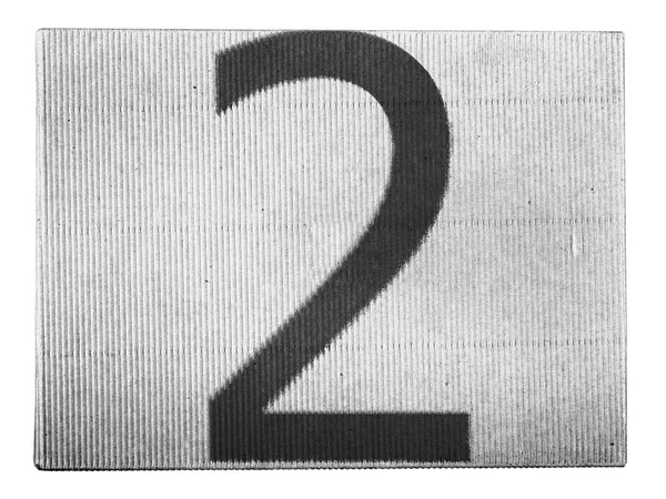 2. Due numeri dipinti su scatola di cartone — Foto Stock