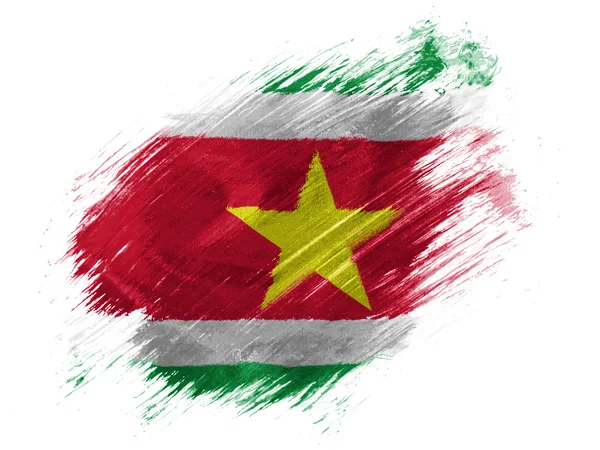 Bandeira do Suriname pintada com pincel sobre fundo branco — Fotografia de Stock