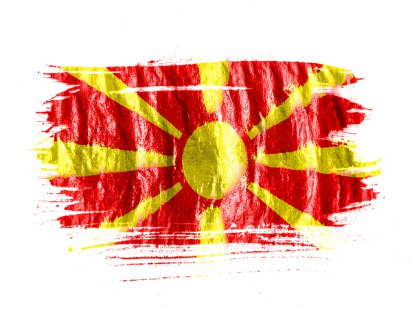 Islak beyaz kağıt üzerine suluboya ile boyalı Makedonya bayrağı — Stok fotoğraf