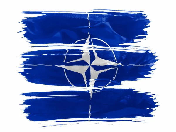 Symbole de l'OTAN peint sur trois traits de peinture en blanc — Photo