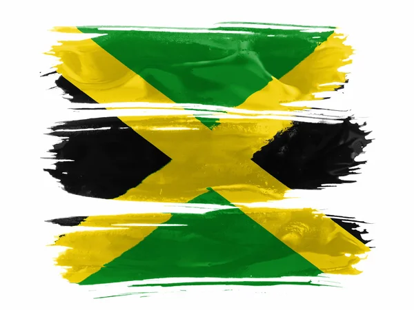 Σημαία της Τζαμάικα ζωγραφισμένα με τρεις πινελιές του χρώματος σε άσπρο — Φωτογραφία Αρχείου