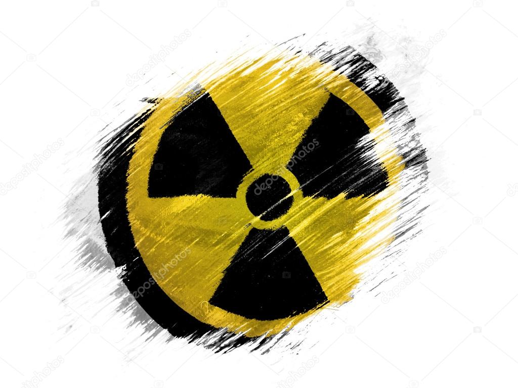 Nuclear radiation symbol painted on painted with brush on white background