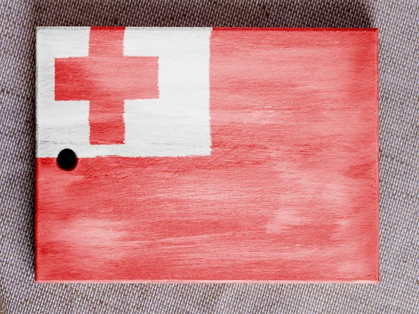 Bandeira Tonga pintada sobre tábua de madeira — Fotografia de Stock