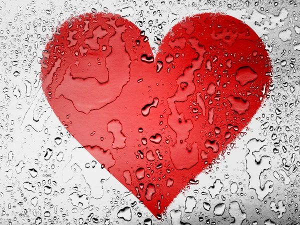 Κόκκινη καρδιά σύμβολο, ζωγραφισμένη στη καλύπτονται με σταγόνες νερό — Φωτογραφία Αρχείου