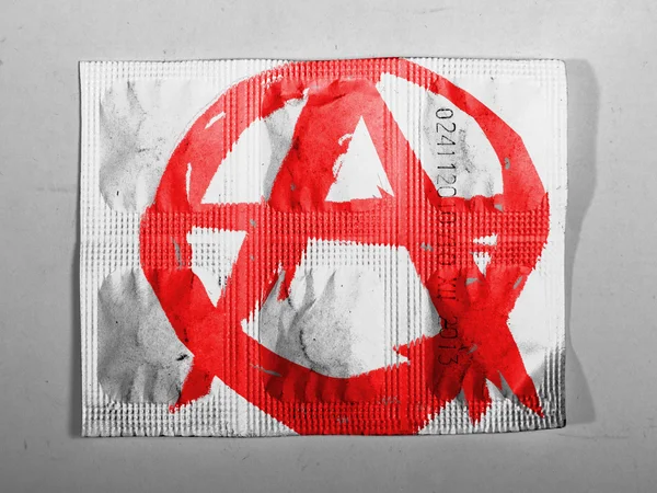 Anarchy symbol painted n painted on pills — Stock Photo, Image