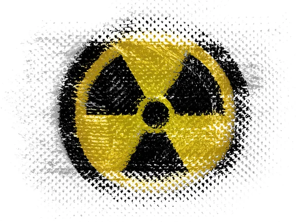 Nuclear radiation symbol painted on on dotted surface — Stock Photo, Image