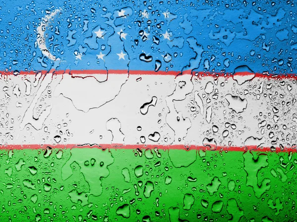 Uzbekistan flag covered with water drops — Stock Photo, Image