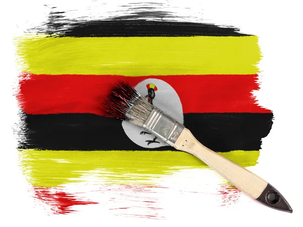 Uganda flag painted with brush over it — Stock Photo, Image