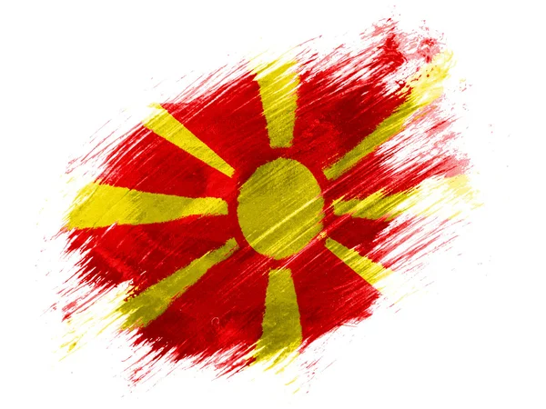 Macedónia bandeira pintada com escova sobre fundo branco — Fotografia de Stock