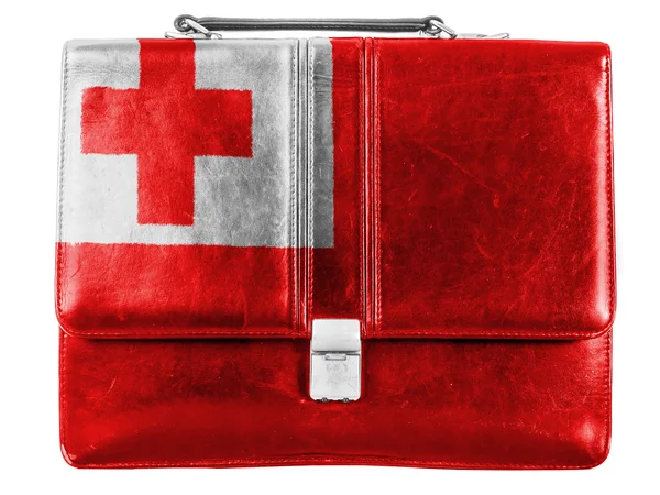 Tonga-Flagge auf kleine Aktentasche oder Lederhandtasche gemalt — Stockfoto