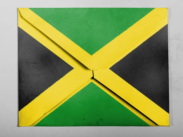 Bandeira da Jamaica pintada em envelope cinza — Fotografia de Stock