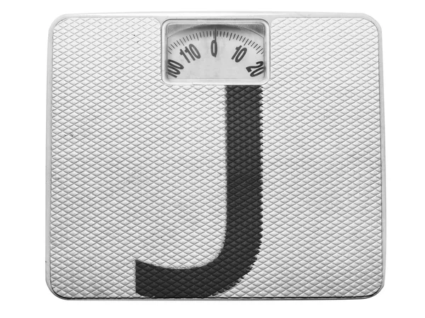 J letter painted on balance — Stock Photo, Image