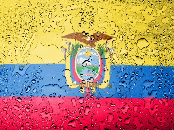 Vlajka Ekvádoru pokryté kapkami vody — Stock fotografie