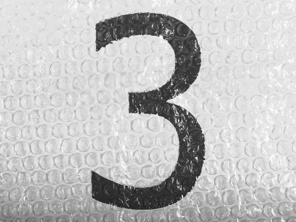 3. Three number painted on bubblewrap — Stock Photo, Image