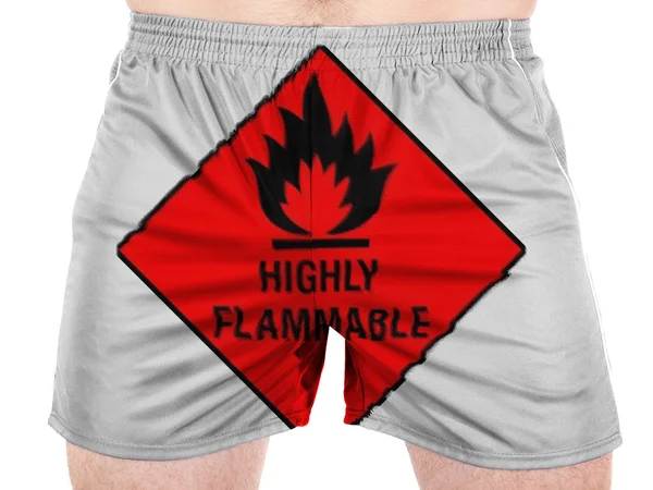 Highly flammable sign drawn on painted on sport shirts — Stock Photo, Image