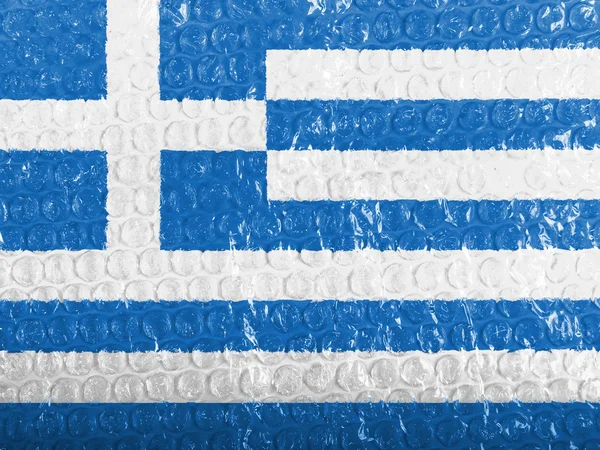 Grecką banderą — Zdjęcie stockowe
