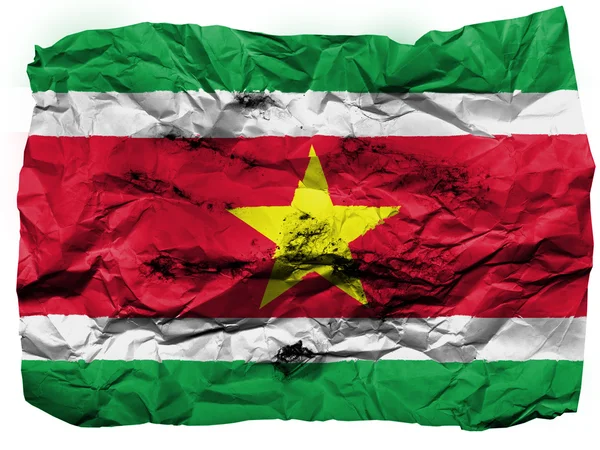 Surinams flagga målade på skrynkligt papper — Stockfoto