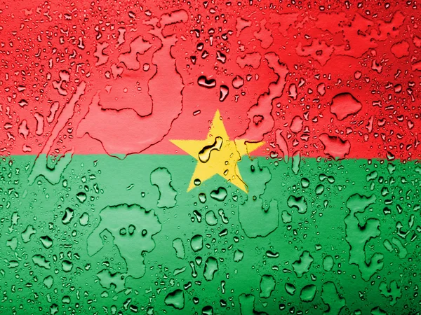Burkinafahne mit Wassertropfen bedeckt — Stockfoto