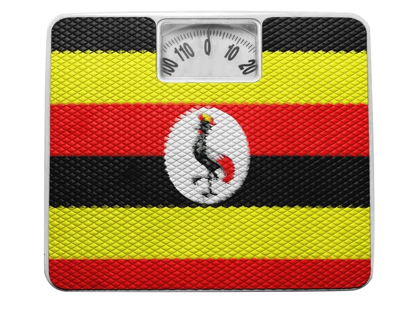 Uganda flag painted on balance — Stock Photo, Image