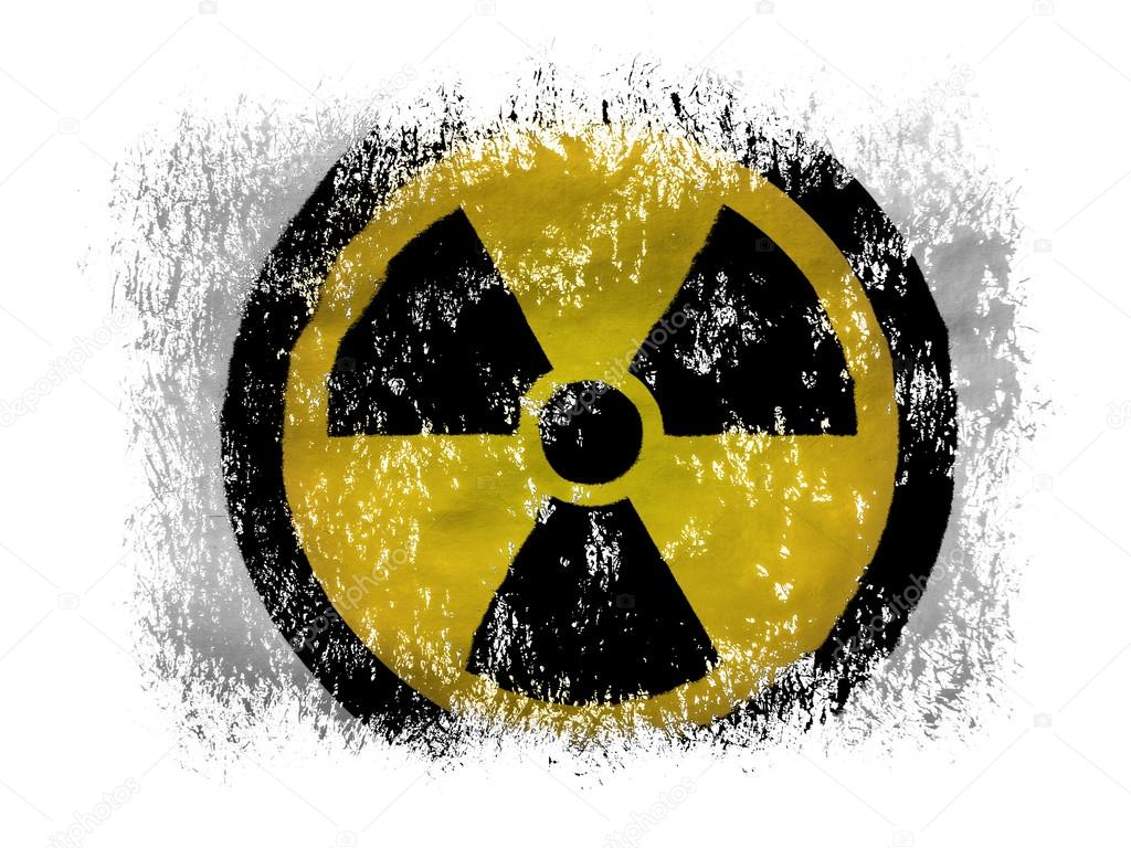Nuclear radiation symbol painted on on white background