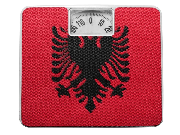 Albania. flagi Albanii, malowane na bilans — Zdjęcie stockowe