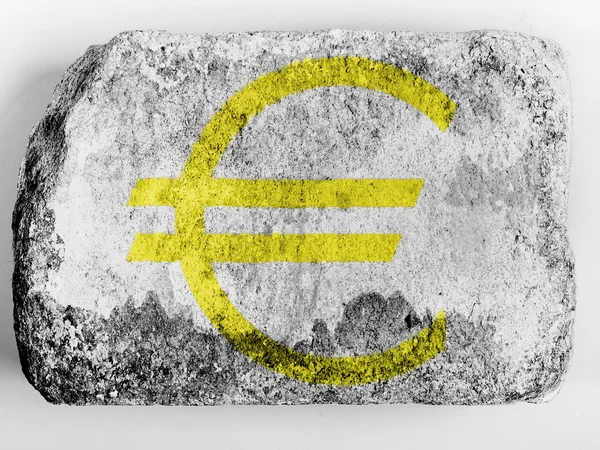 Euro currency sign painted on painted on brick — Stock Photo, Image