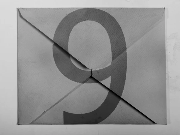 9 Nine painted on grey envelope — Stock Photo, Image