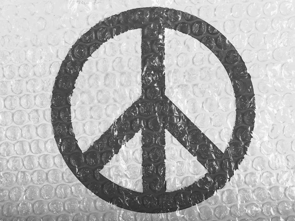 Peace symbol painted on painted on bubblewrap — Stock Photo, Image