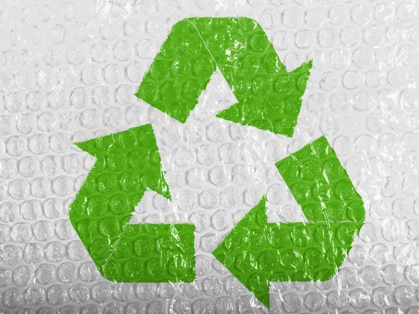 Recycle symbol painted on painted on bubblewrap — Stock Photo, Image