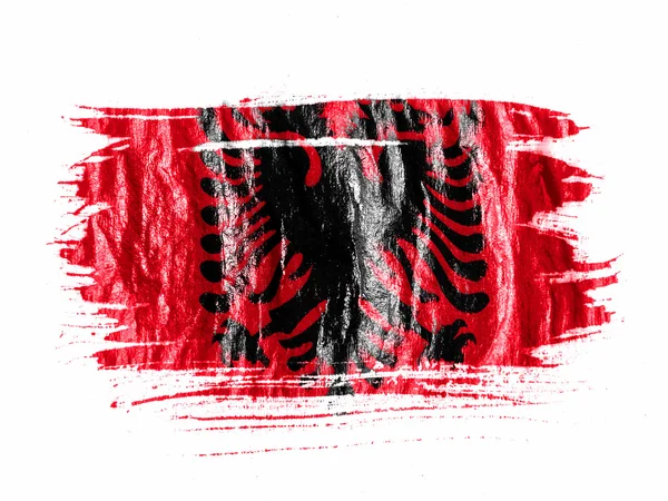 Arnavutluk. ıslak beyaz kağıt üzerine suluboya ile boyalı Arnavutluk bayrağı — Stok fotoğraf