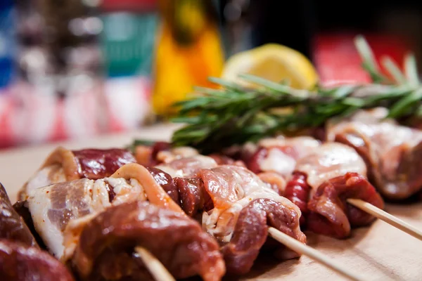 Meat rolls with bacon on stick — Stock Photo, Image