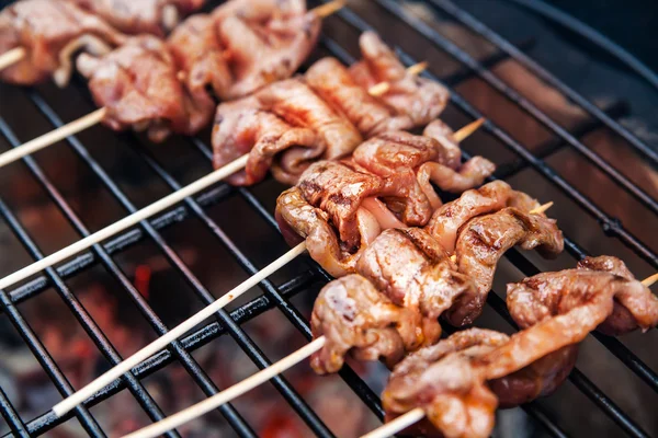 Meat rolls with bacon on grill — Stock Photo, Image
