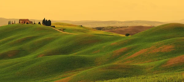 Puesta de sol en Toscana paisaje — Foto de Stock